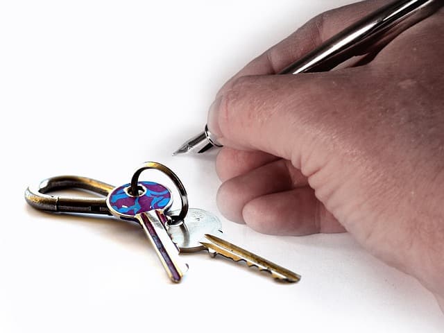 A man holding a pen