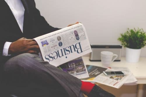 Someone reading a newspaper