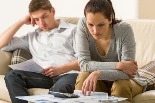 Couple looking at bills