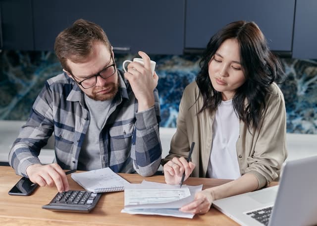 couple looking at paperwork