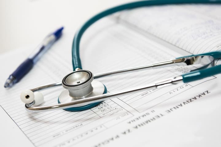 A stethoscope and an important document