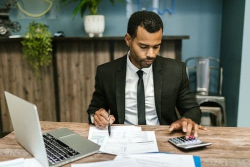 Mortgage broker calculating his salary