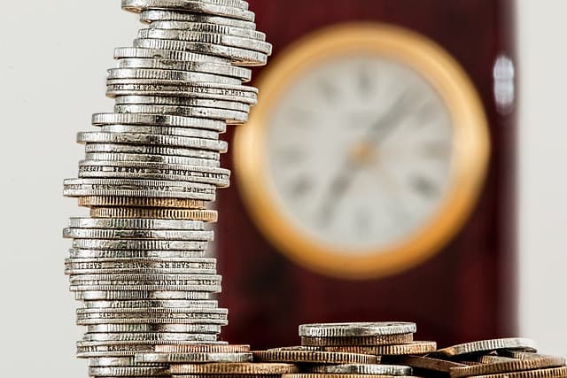 Des pièces de monnaie qui représentent des frais liés à une hypothèque